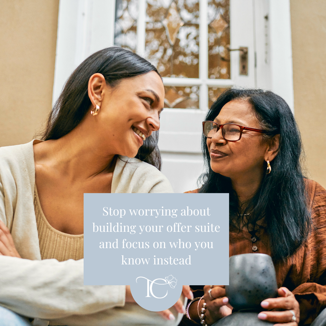 Two senior women professionals in conversation, representing trusted relationships and career opportunities that often lead to first fractional leadership clients.