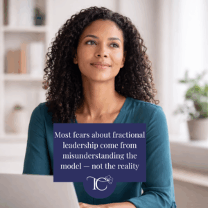 Confident senior woman working on a laptop, representing clarity about common myths surrounding fractional leadership